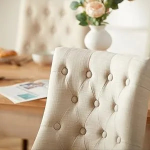 A set of 4 Side Dining Chairs with Plush Buttons